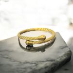 Γυναικείο Ατσάλινο Βραχιόλι Στριφτό Σε Χρυσή Απόχρωση